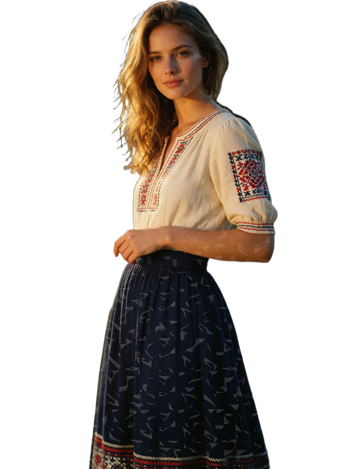 Elegant Czech woman in a cream embroidered blouse standing near a golden-hour riverside view
